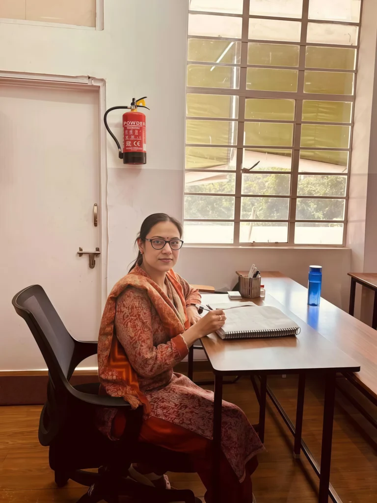 Maths coaching in Chandigarh featuring Ritu Goyal conducting focused academic planning and problem-solving sessions, delivering structured CUET and Applied Maths preparation in a professional classroom environment.